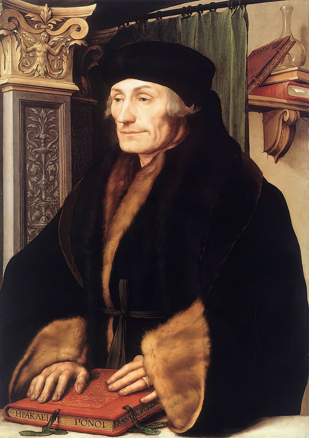 Painting of a thin-faced man in a black cap and fur-trimmed black gown, his hands resting on a book
