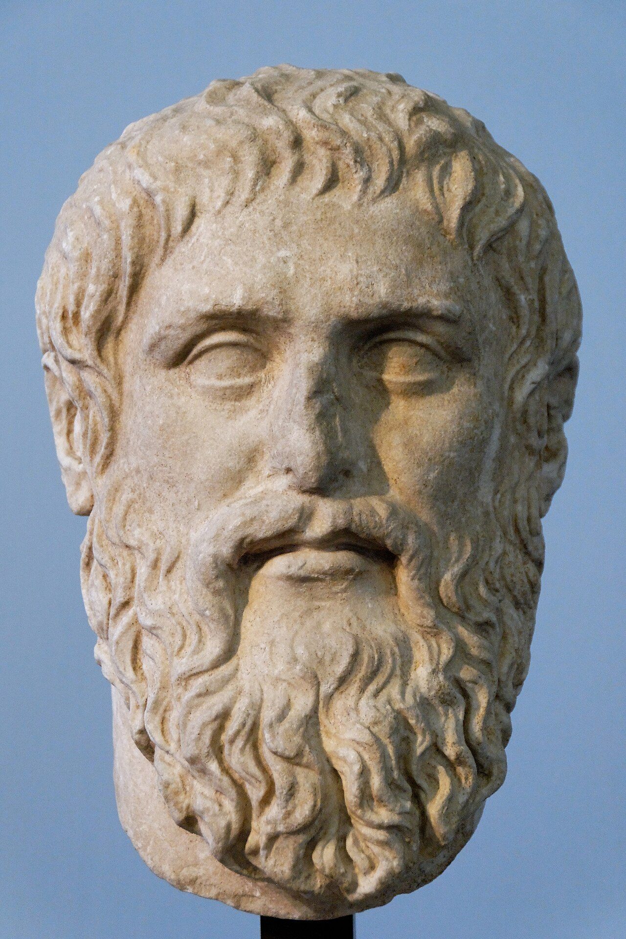 Marble head of a bearded man with a furrowed brow